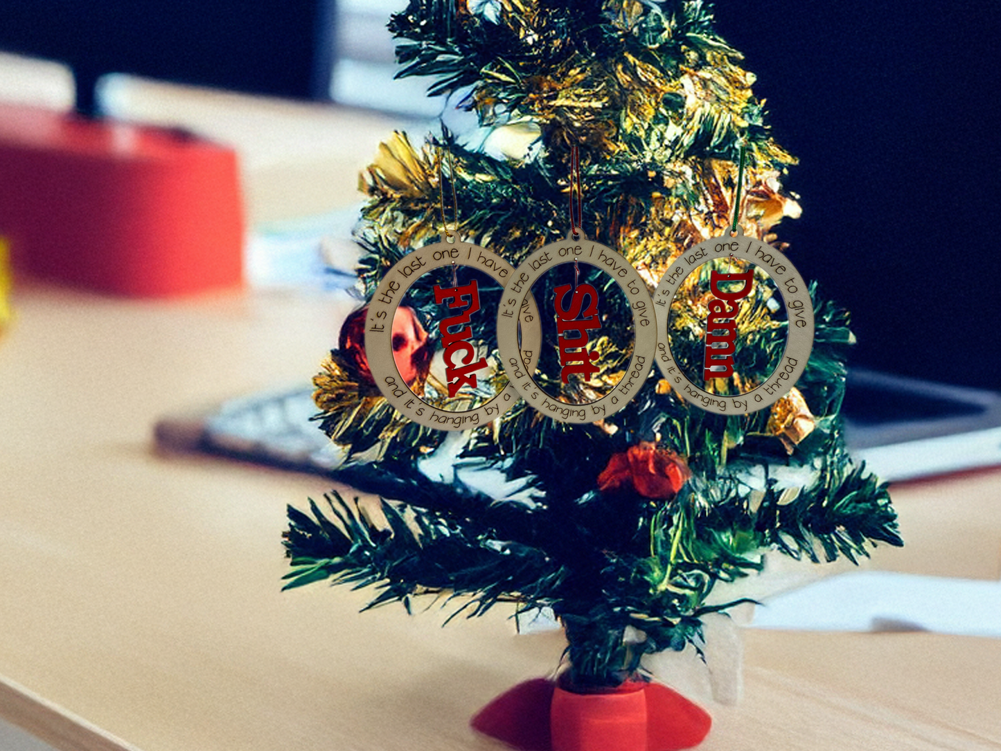 "Hanging by a Thread” Ornament